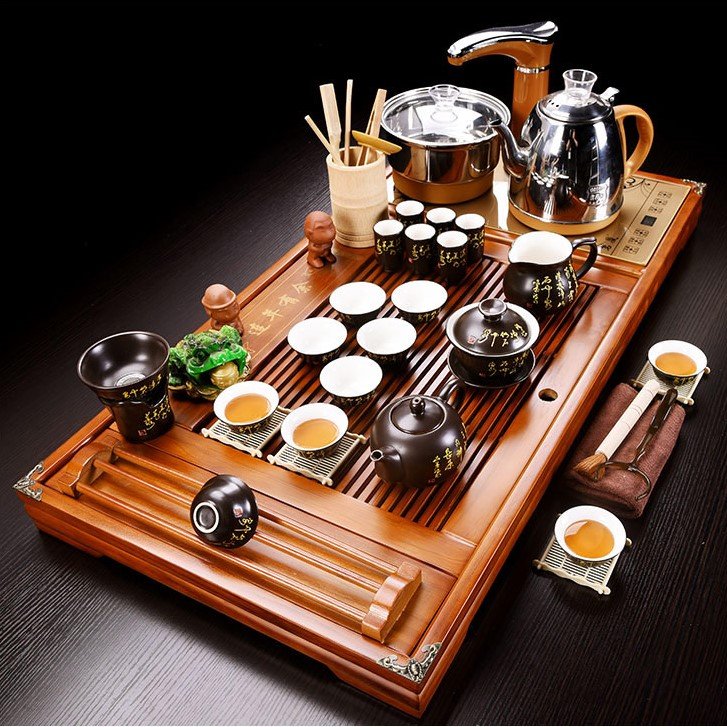 z2379956174388_1b979956f9bc2fc083f70106e6c914bb.jpg Bàn Trà Điện thông minh Nan Gỗ Vượng Tài - Image 1